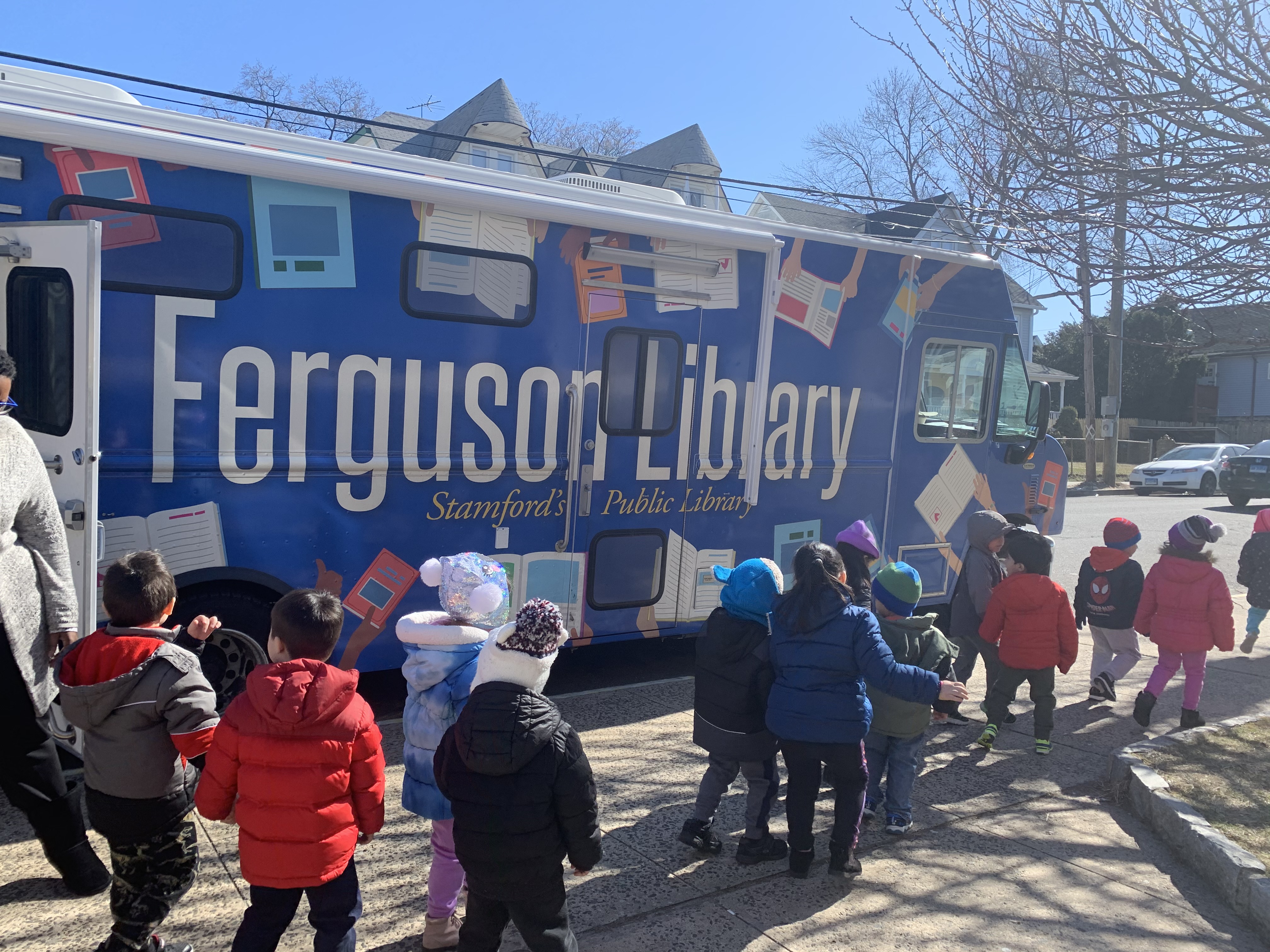 Bookmobile at CLC with kids outside