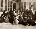 Crowd of children in library ca. 1909