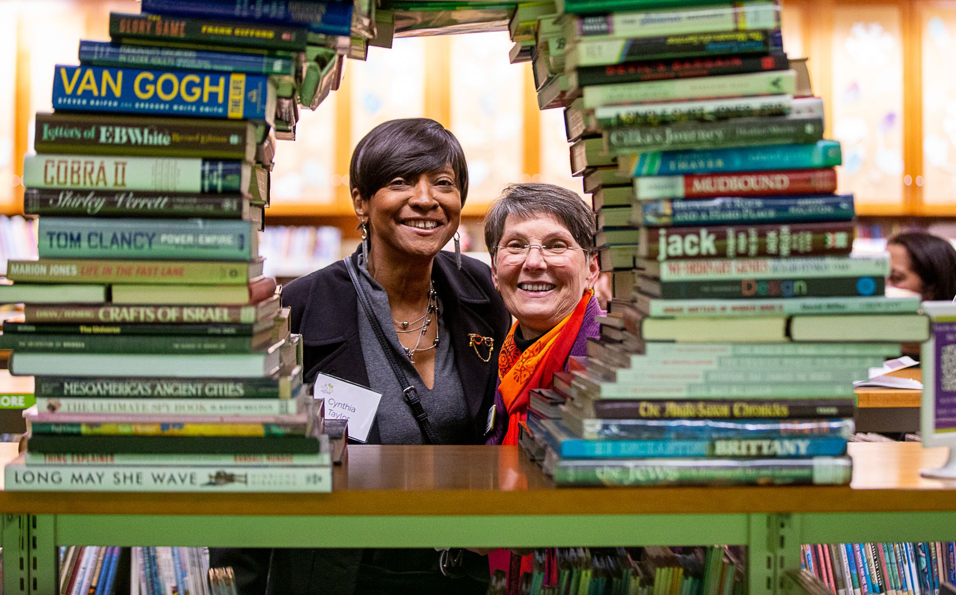 Cynthia Taylor and Cathy Ernst book arch
