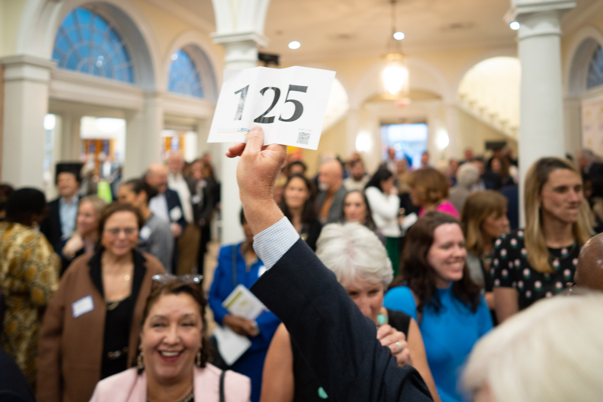 Live auction arm up bidding.jpg
