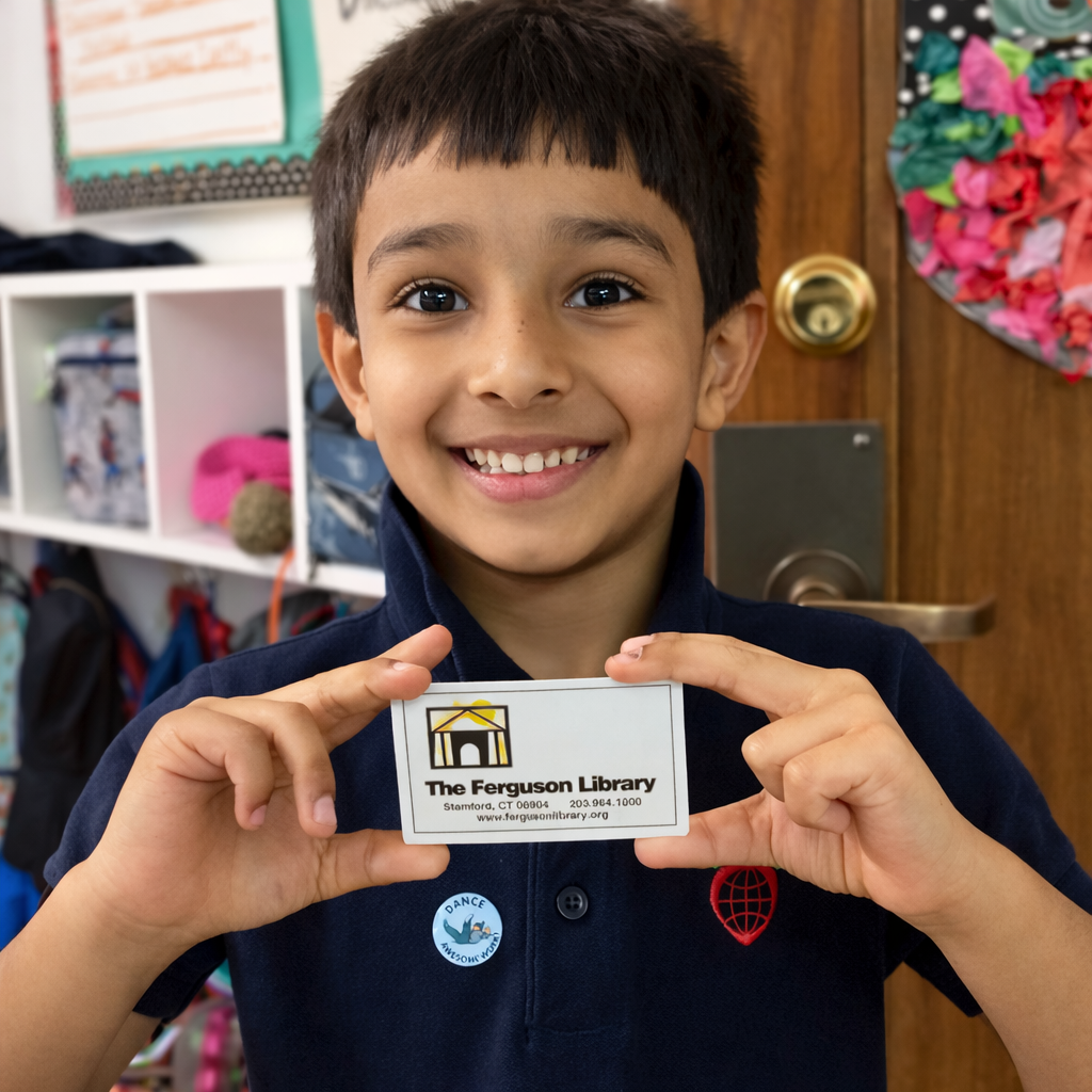 Boy with new Library Card