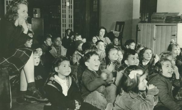 young class of students in historical photo of Ferguson Library